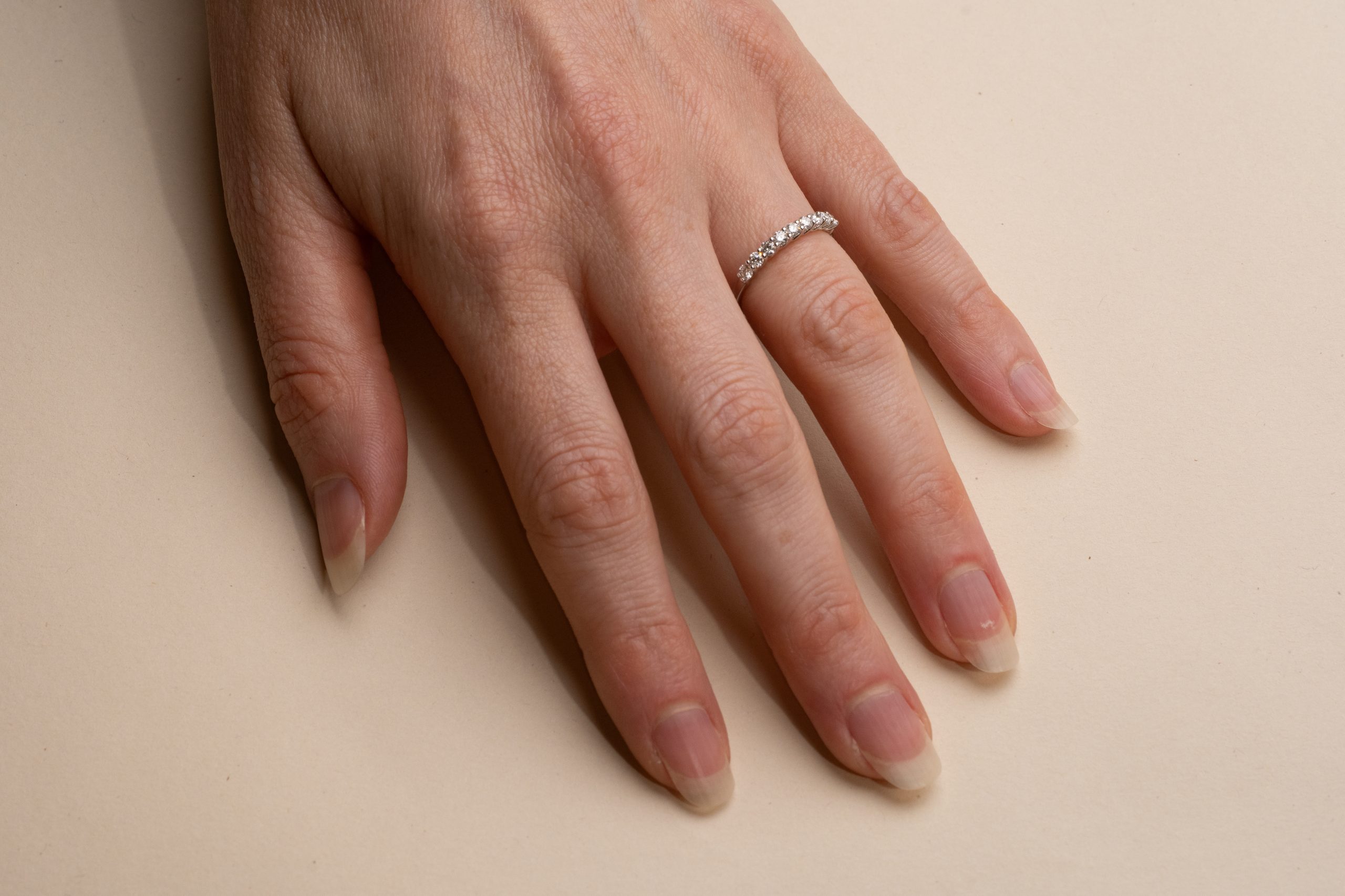 Alliansring vitguld Italien nio stenar