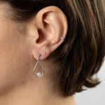 Droppe med saltvatten pärla vit guld